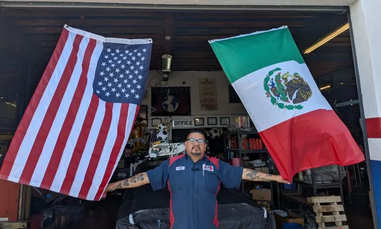 Juan Cortes outside his mechanic shop in Los Angeles, June 11, 2026