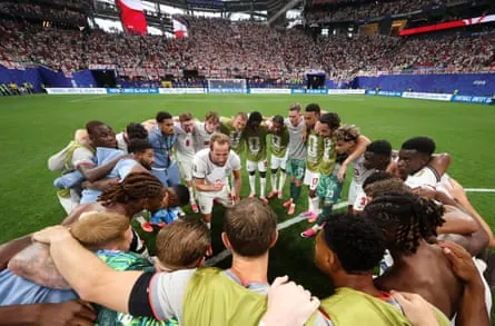 Kane speaks to England teammates at full time.