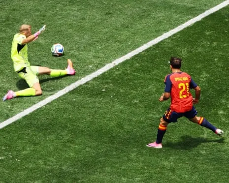 Spain's Mikel Oyarzabal scores their third goal, and his second, past Austria's Alexander Schlager .